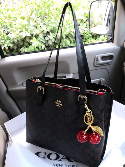 Coach Mollie tote bag with Cherry keychain Brown