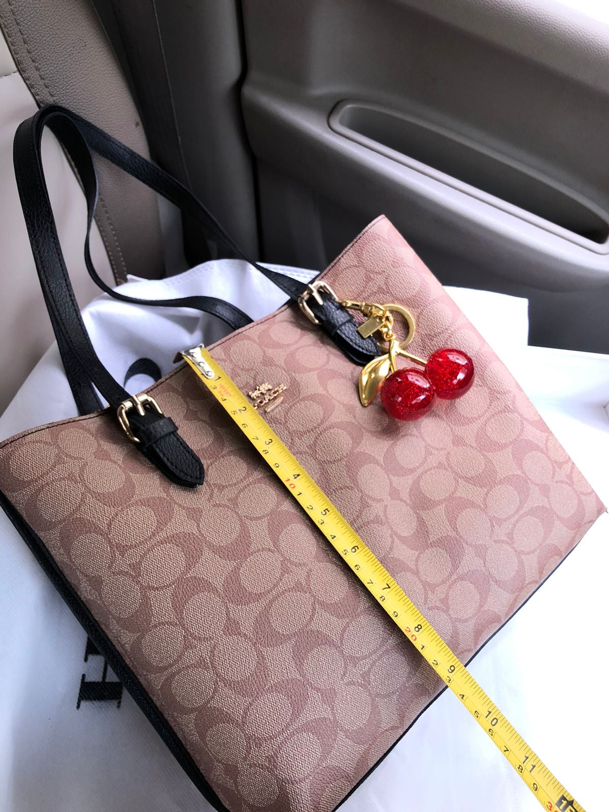 Coach Mollie tote bag with Cherry keychain