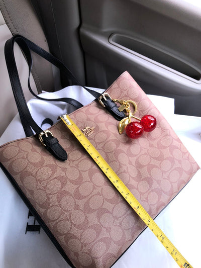 Coach Mollie tote bag with Cherry keychain