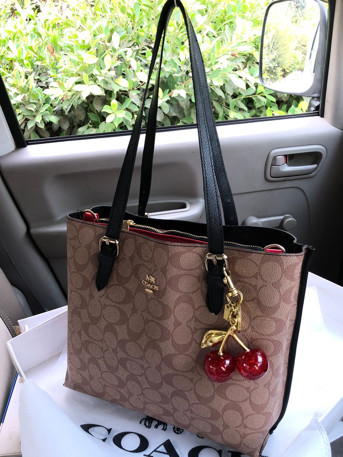 Coach Mollie tote bag with Cherry keychain Beige