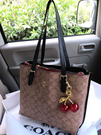 Coach Mollie tote bag with Cherry keychain Beige
