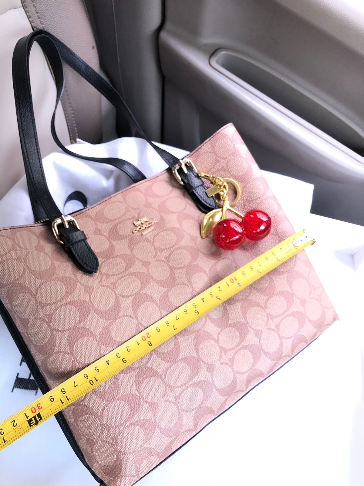 Coach Mollie tote bag with Cherry keychain