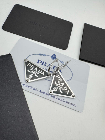 Prada Symbole Triangle Pendant right earring