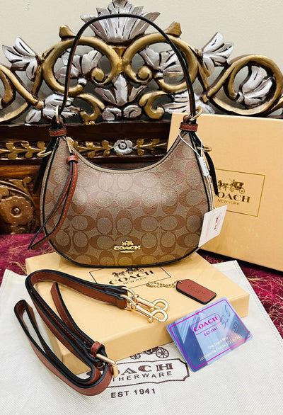 Coach Kleo Hobo Bag in Signature Canvas Beige