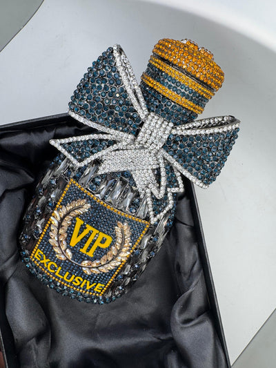 rhinestone-embellished clutch bag shaped like a bottle, with a bow and the text for Women