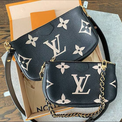 Louis Vuitton LV POUCH MONOGRAM EMBROIDERED POCHETTE BAG.