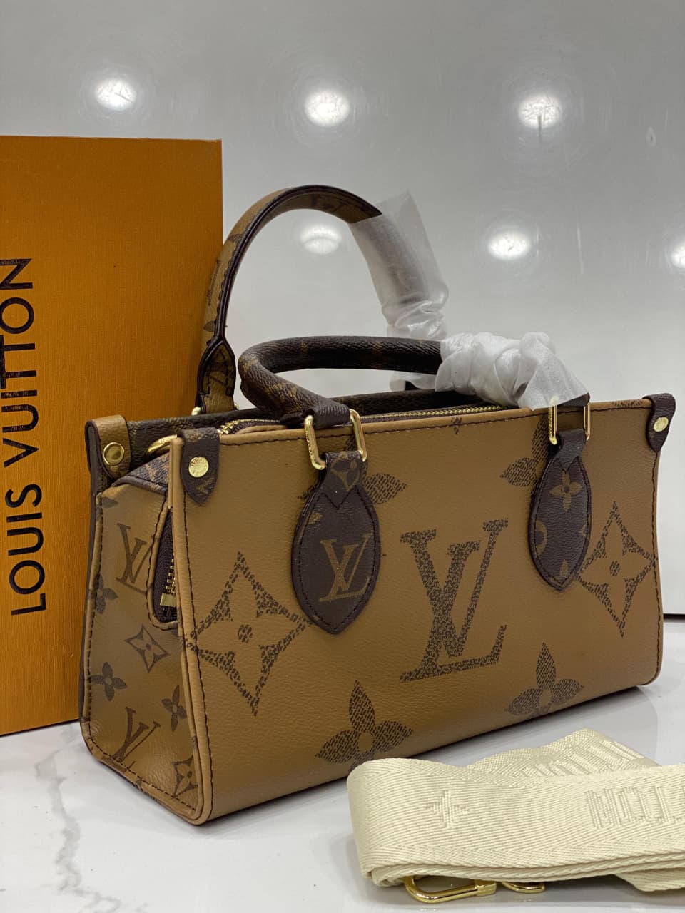 Louis Vuitton LV Onthego East West Monogram Embossed